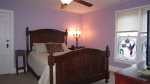 Upstairs bedroom with a queen size bed